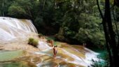Stunning waterfalls in beautiful rainforest setting in area managed by local community ecotourism project
